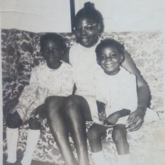 My Mummy Aduke Folayan holding me and Morenike!!