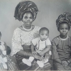 Mummy Caroline with children Bolaji, Folabi and Morenike!