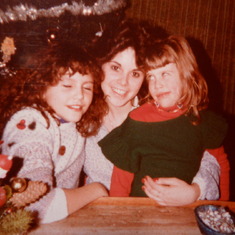 Hilarious pic of Caroline rolling her eyes and smirking at my sister at Christmas time in the early eighties.