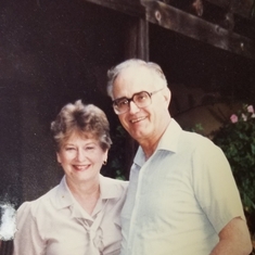 Carolyn (Mom) and dad visiting friends.