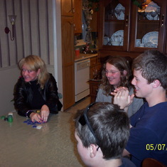 Carolyn teaching Mark how to play Poker
