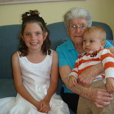 Chloe with Great Grandma on her Holy Communion day with Cousin Jack. (April 2009)