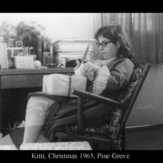 Kitti opens presents on Christmas day 1965, PineGrove, Somerset NJ