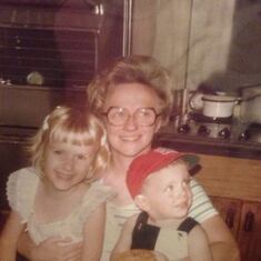 Young Cathy with Young Barb, age 7, in her mother's kitchen in Highlandtown. Also on her lap is her eldest nephew, Michael Schumcher, age 2.