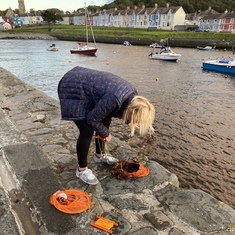 Celia getting stuck in to ensure the crabbing kit is in order for the boys! 