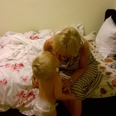 Ethan giving Grandma a good night kiss