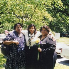 Ceretta with her sisters, Pam and Sheila at their mother's burial.