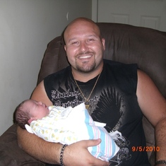 Uncle Dusty holding Parker when he came home
