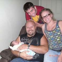 Dusty holding Parker with Chad and Linsey !