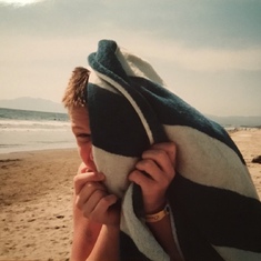 On the beach & not ready to have your pic taken; just wrap yourself in a beach towel