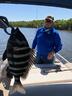 Chad fishing with friend Bill Richards - the BIG catch of the day.