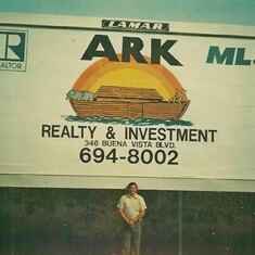 Chad in front of ARK billboard on Colonial Blvd