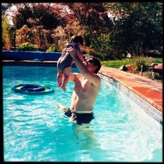 Charlie teaching Eli about pools and swimming