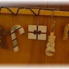 SOME OF THE WOODEN
ORNAMETS MADE BY CHARLES
FOR EACH OF HIS GRANDCHILDREN
EVERY CHRISTMAS