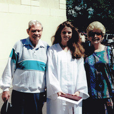 Dad with me and my mom at my high school graduation in 2000.