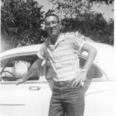 Chuck with his first car, a 1950 Chevy