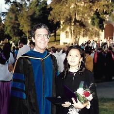 Chuck with Suzanne Pham at graduation 1989