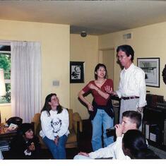 Hosting students at dinner in 1995
