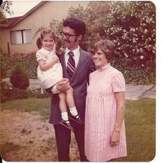 Chuck holding Kristin when Margo was expecting Heidi 1976