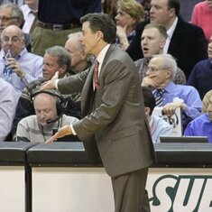 Chuck courtside with Rick Pitino in 2009