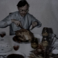 Dad Carving the Turkey at One of Many Thanksgiving Dinners