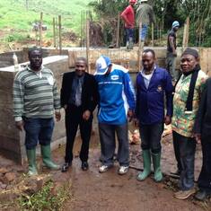 Visiting Community bridge construction project in Nyenegwi Guzang