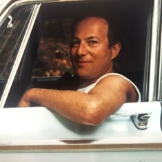 Charlie styling' in his powder blue Dodge Coronet, 1986