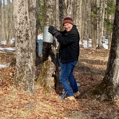 Gathering maple sap, Charlie was a dedicated assistant sugar maker