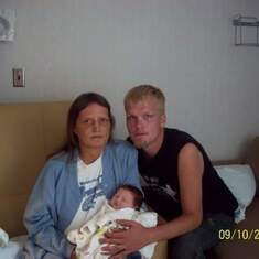 Mom and Jason at the hospital the day after I gave birth to Kylie.  