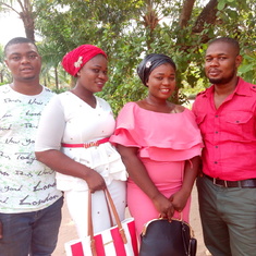 Chioma and siblings at church