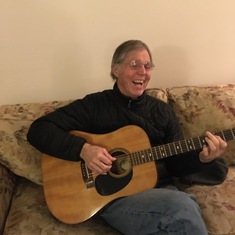 making music at his 70th birthday party Dec. 2019