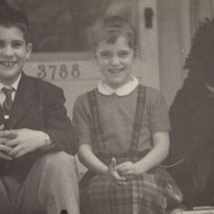 1957 with sister Malvina and family pet Nina