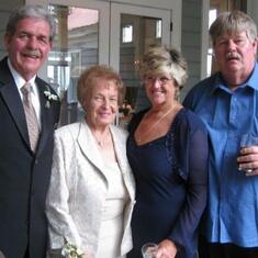 Chris with Ken Jr., Carol, and Den Sr. at Stacy's wedding.