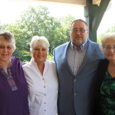 with sisters Linda, Jackie and Annette