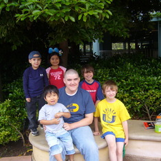 Chris with Luke, Shane, Kyler, Aika, and Jr in 2004 at Disney Sea.