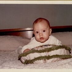 Baby Chris on pillows