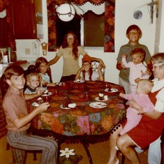 Cousins Harry, Chris, Eileen, Annette, Krissy, Pete, Barbie & Sister Laura on Oma's lap