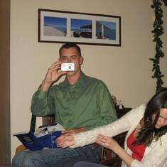 Chris and I taking pictures of each other at Christmas.