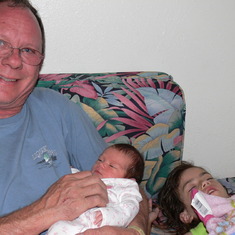 Grandpa with his two grand daughter.