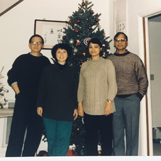 With Dr. Arup Mallik & his wife Bharati at our Greensboro home , Christmas 1995.