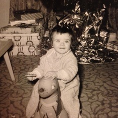 Cindy as a baby at Christmas.