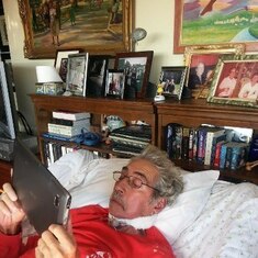 recent picture of Dad reading his e-mails