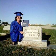 This is me at my Daddy's grave the day I graduated college with a degree in Accounting, something I did to fulfill a promise I made to him.