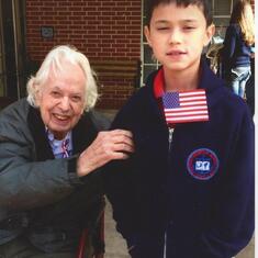 Clay with youngest grandchild Matthew Wang at a Veteran's Day celebration at Southminster School in Missouri City.