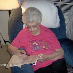 CLARICE R. OVERTON WORKING ONE OF HER WORD SEACH PUZZLES.