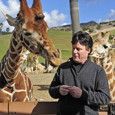 At the San Diago Safari Park on holiday in 2012 - Claude feeds the giraffe!