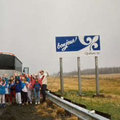 Claude arriving on the boarder with Quebec with French immersion students from Royal Orchard, 1989