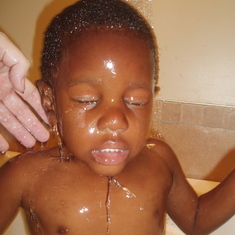 Augustin having a bath shortly after arrival from Haiti, Nov. 2006