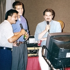 Karaoke, with brother Mark and nephew Evan at parents' wedding anniversary celebration, 1997