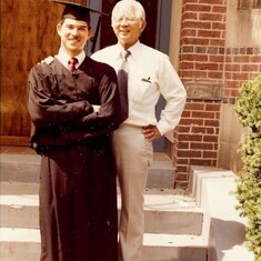 With dad at graduation